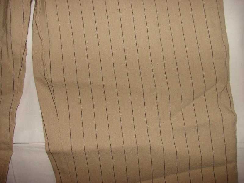 Ciamberra Spodnie beżowe w paski rozm.M/L wysoki stan dzwony