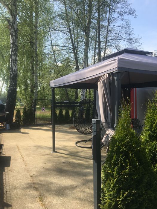 Domki murowane i holenderskie przy wodzie  Rokitki