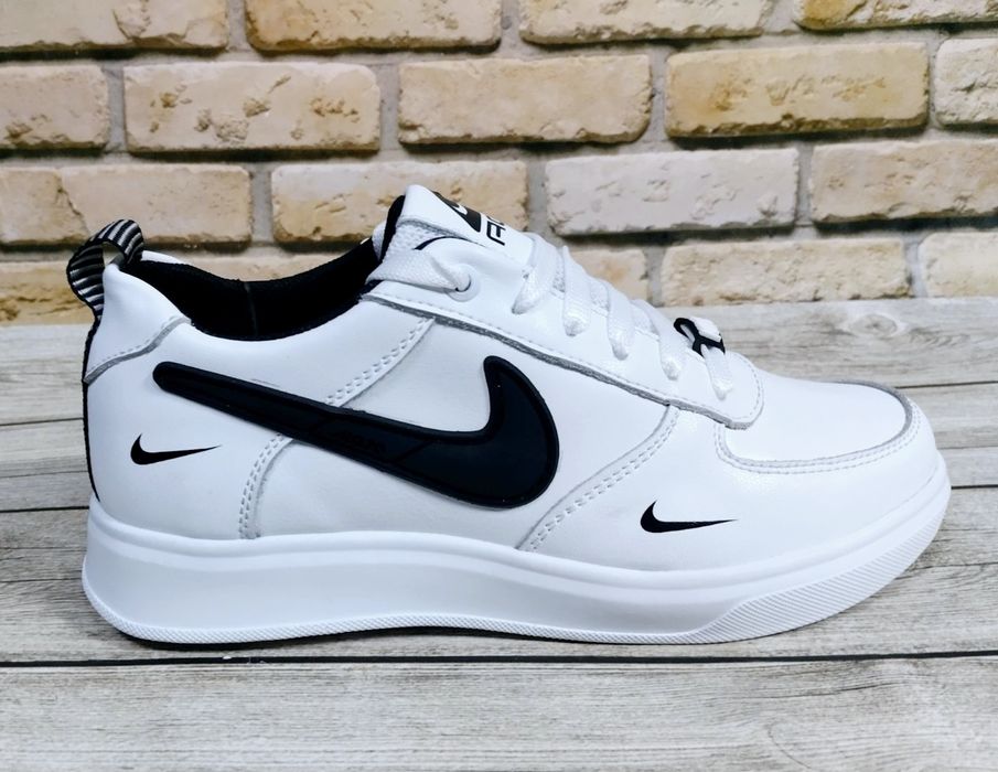 Білі шкіряні кросівки Nike 35-39p