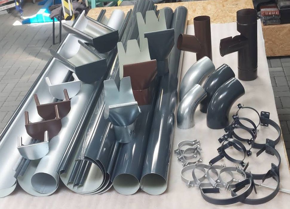 Rynny,rury,, parapety, obróbki blacharskie.