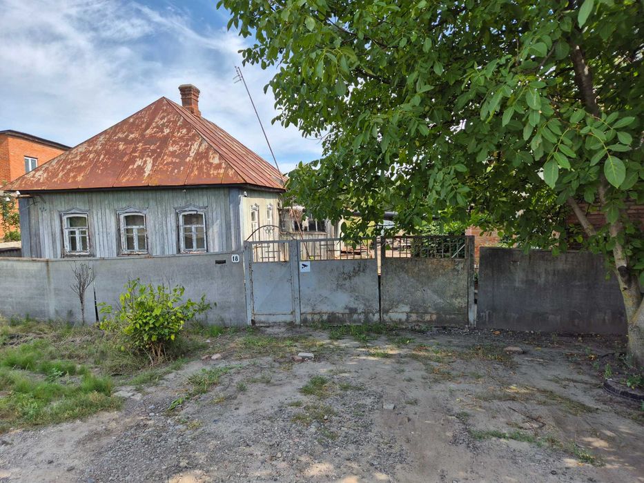 Продам земельну ділянку і будинок у м.Охтирка