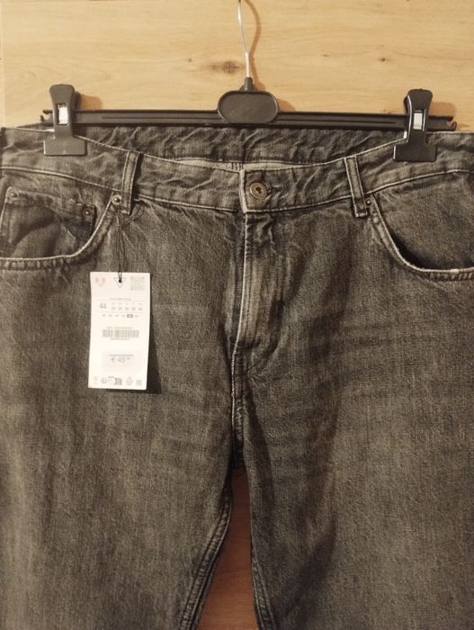 Męskie czarne spodnie jeansowe flare Zara r.44
