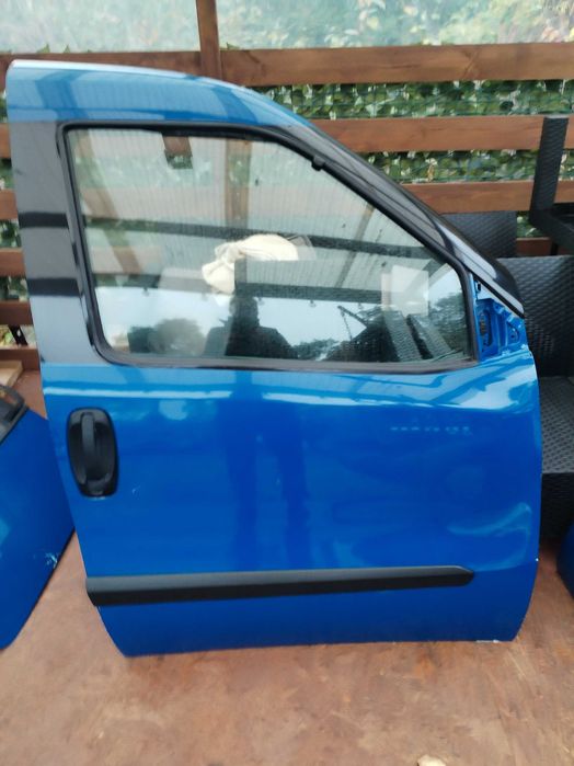 Drzwi boczne przód prawe Opel combo fiat doblo 2014 r niebieskie