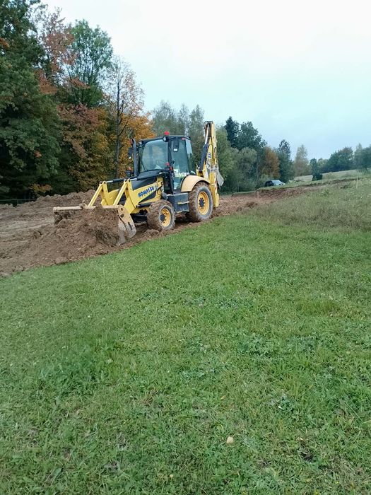 Usługi koparko-ładowarką+wywrotka  4×4