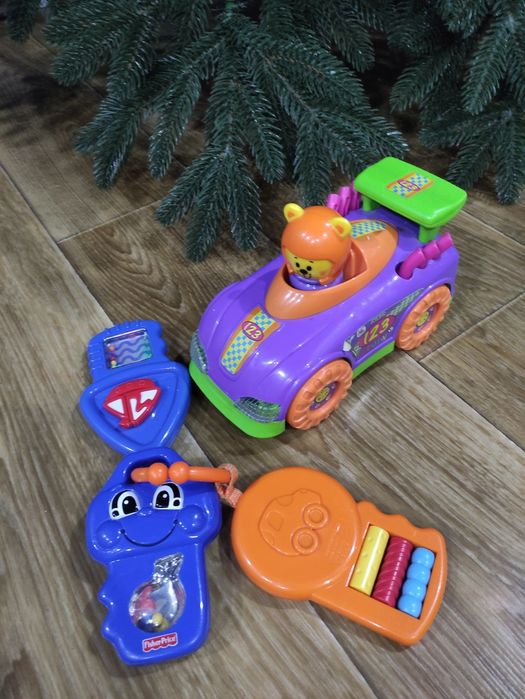 Развивающие игрушки погремушки Chicco, Fisher Price, ELC,Tolо