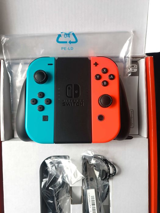 Портативна ігрова приставка Nintendo Switch OLED with Neon Blue and Neon Red Joy-Con (045496453442)