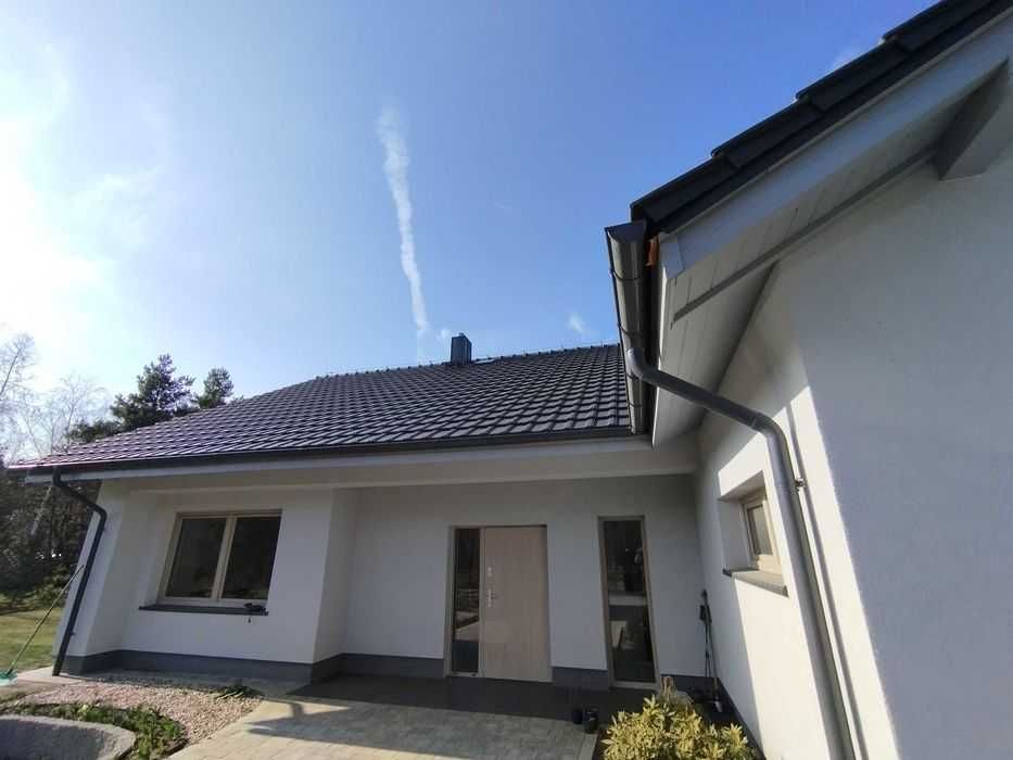Malowanie podbitki dachowej, elewacji ,tarasów drewnianych.