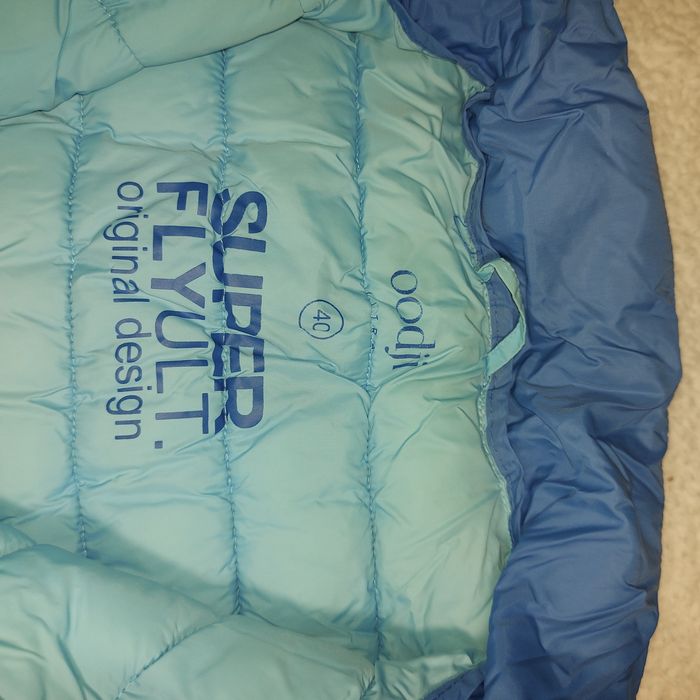 Жилетка на пуху,теплая