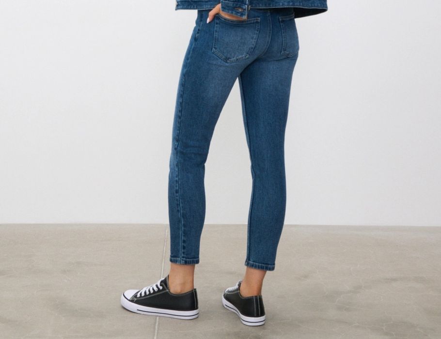 Jeansy mom slim r.34. Sinsay