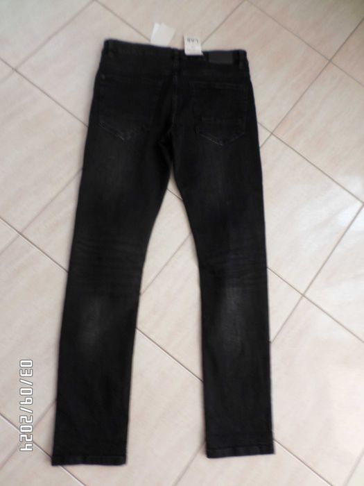 Firmowe spodnie damskie-jeans-S-36/38-elastyczne