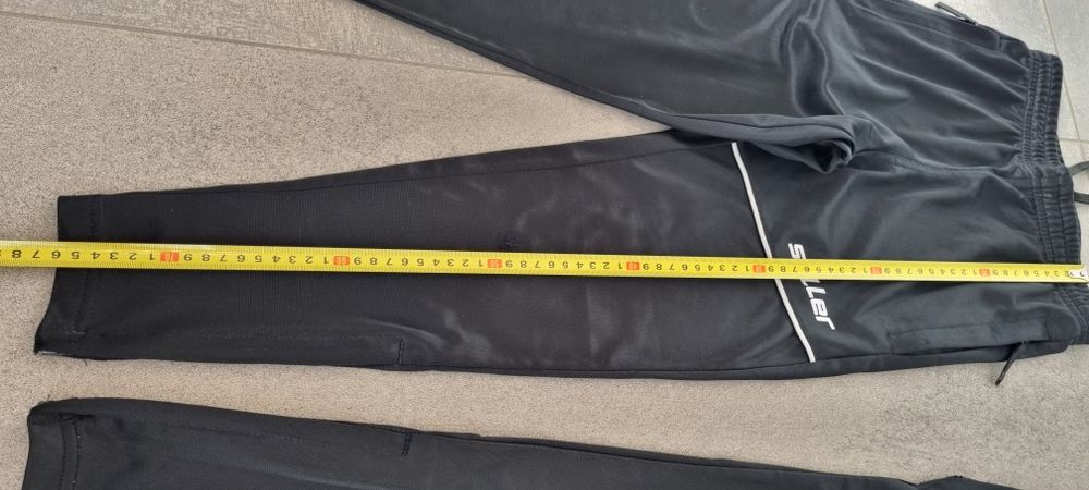 Saller spodnie pilkarskie 128 i getry Nike