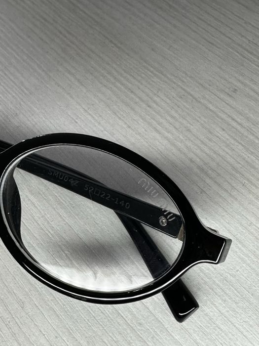 Оригінальні окуляри Miu Miu SMU04Z чорна овальна оправа Італія