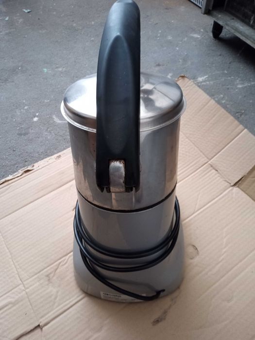 Espremedor de laranjas  AUTOMATICO/ELETRICO (sumo de laranja)