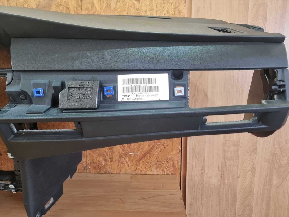 BMW e60 e61 deska rozdzielcza konsola oryginał plus uchwyty na kubki