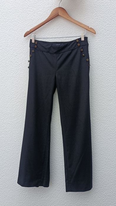 Calças pretas com botões dourados Zara