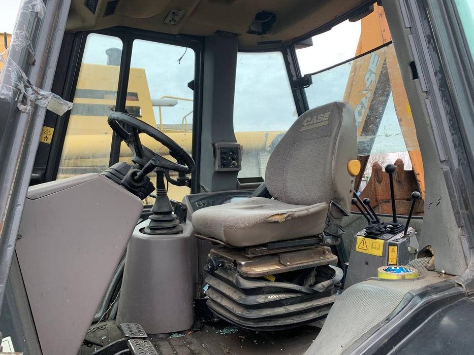 Case 580SM екскаватор навантажувач