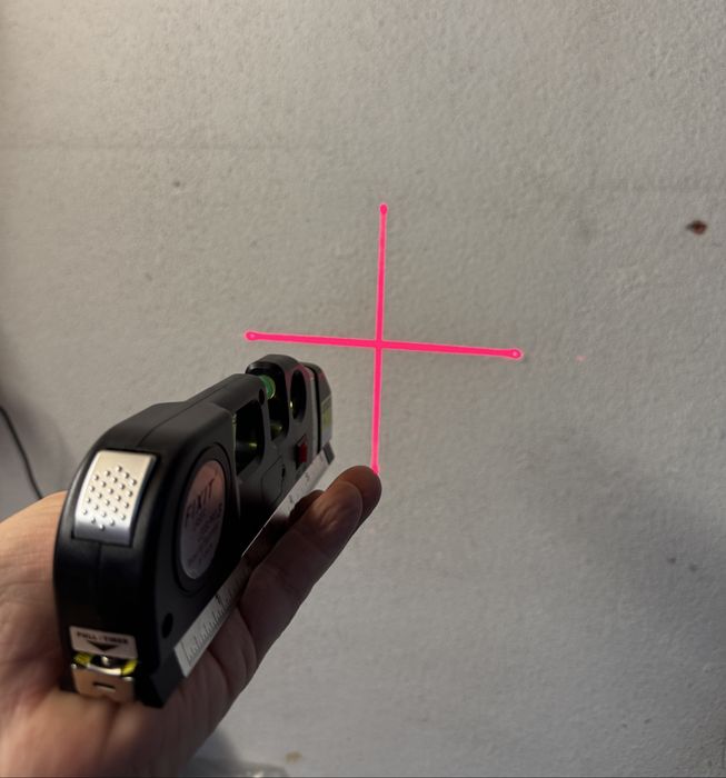 Nivel laser com fita metrica