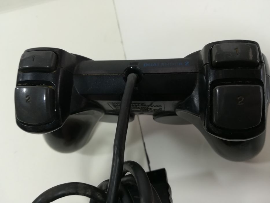 Ігрова приставка PlayStation 2 джойстик.