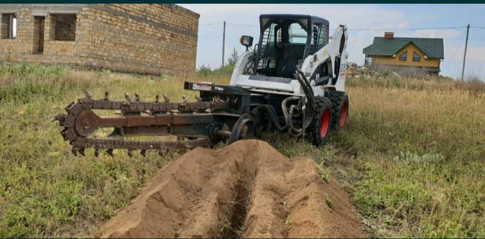 Бобкет навантажувач бобкат погрузчик вили мусор bobcat