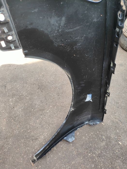 Volkswagen Passat B6 błotnik przedni prawy czarny