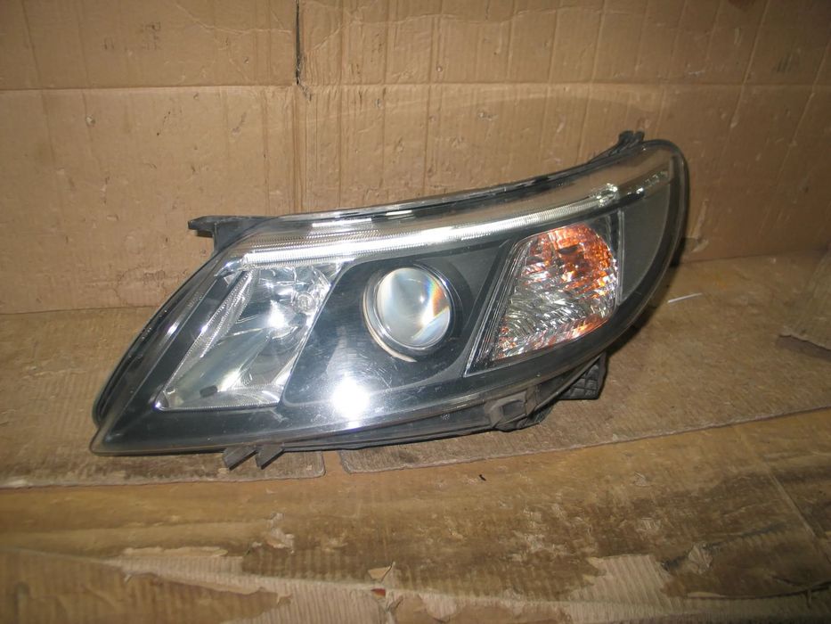lampa xenon przod saab 93 9-3 2 II lift 07-14r. oryginal europa