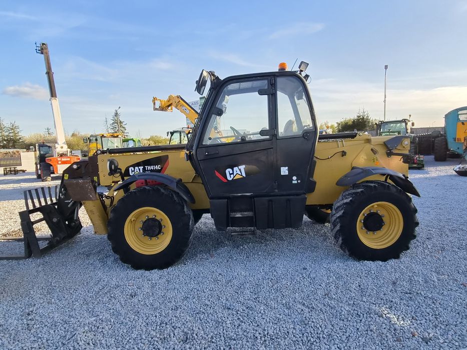 Ładowarka teleskopowa CAT TH414C Jcb 540-140
