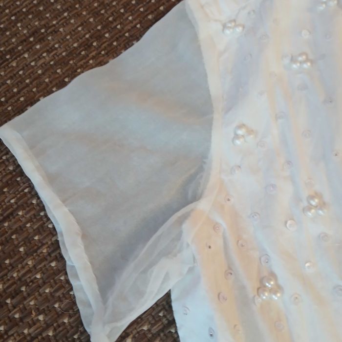 Biała koszula z koralikami