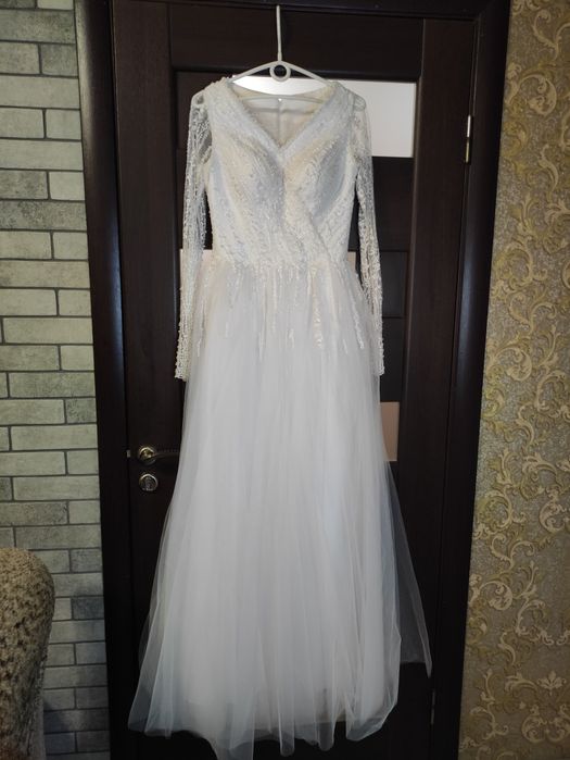 Ніжна весільна сукня