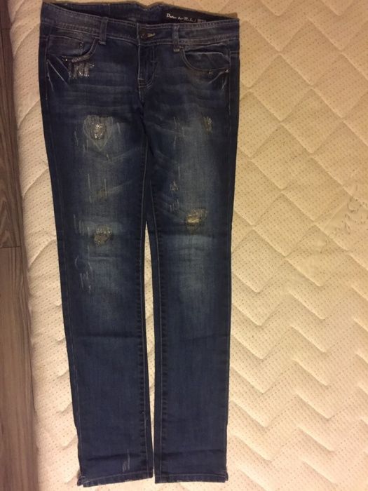 Spodnie jeansy W28