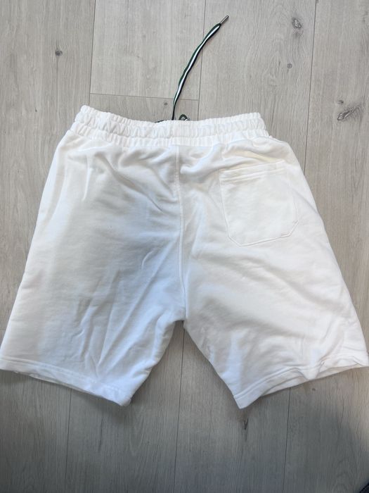 Продам белые шорты Lacoste s