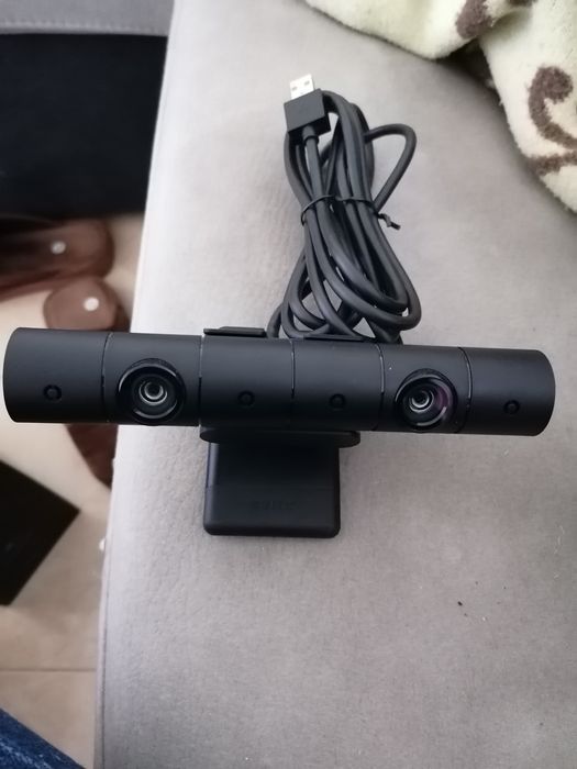 Câmara e auscultadores para ps4 como novos