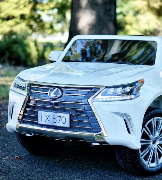 Децкий электромобиль с пультом Лексус  полноприводный двухместный.