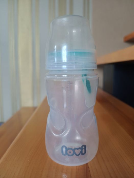 Механічний молоковідсмоктувач + пляшечки lovi, AVENT