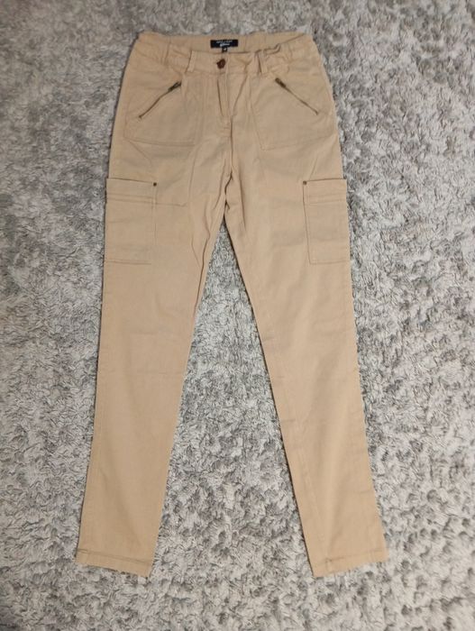 Spodnie dziewczęce beżowe w rozmiarze 158