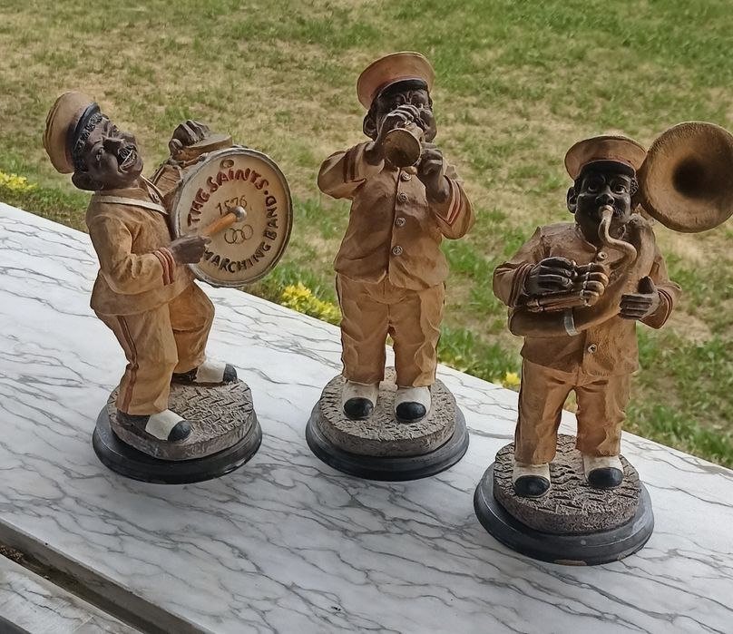 3 estátuas músicos jazz