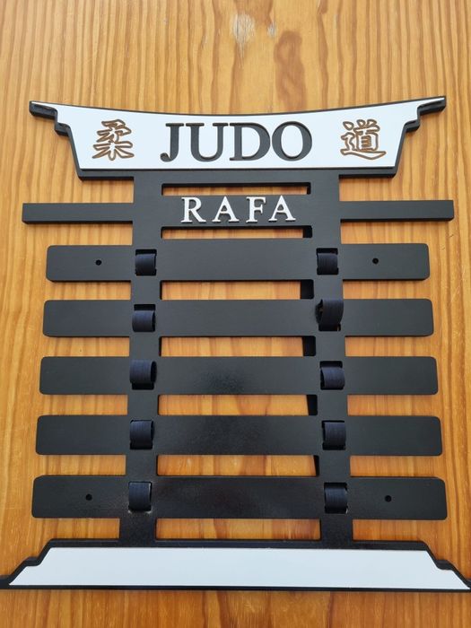 Suporte para faixas e medalhas