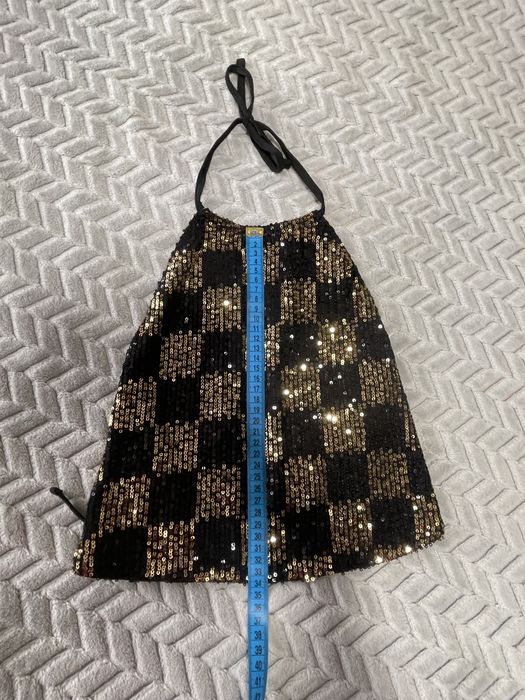 Топ в паєтках