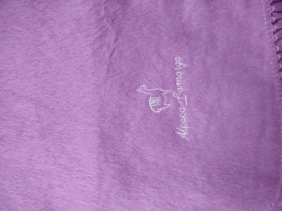 Теплий, м'який та натуральний шарф для холодних зимових днів.