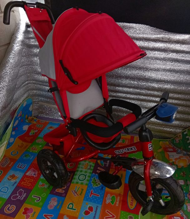 Продам детский музыкальный велосипед-коляска Lamber trike почти новый.