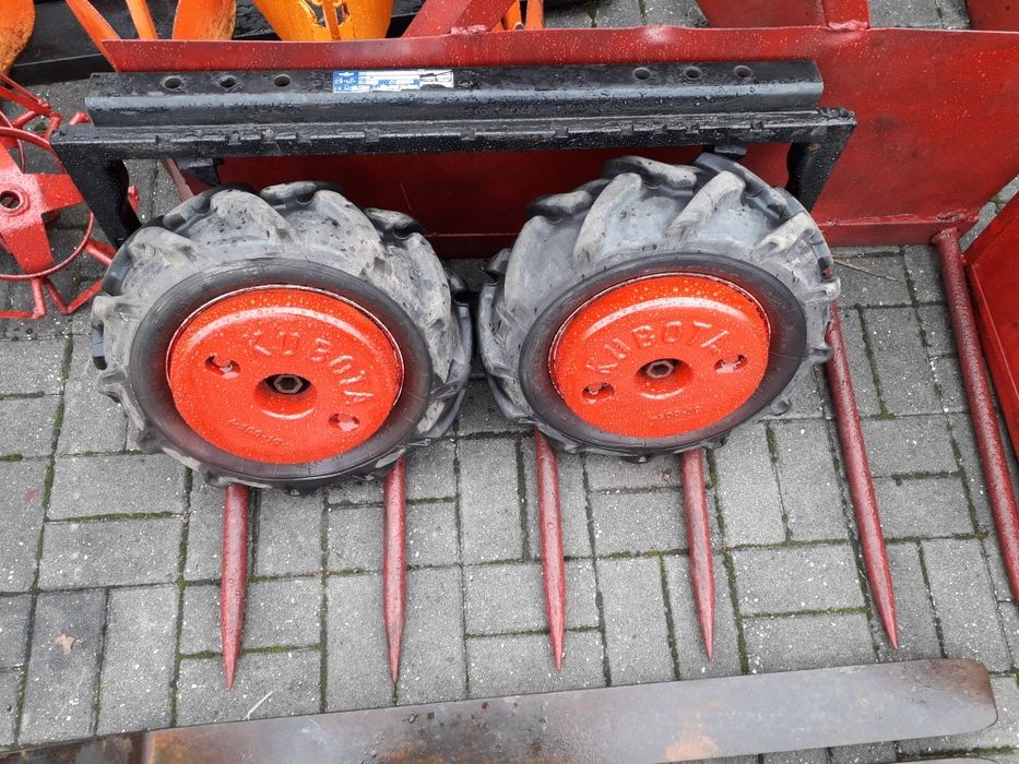 Rodas com pesos 30kg cada kubota e rodas em ferro com 50cm e 60cm para