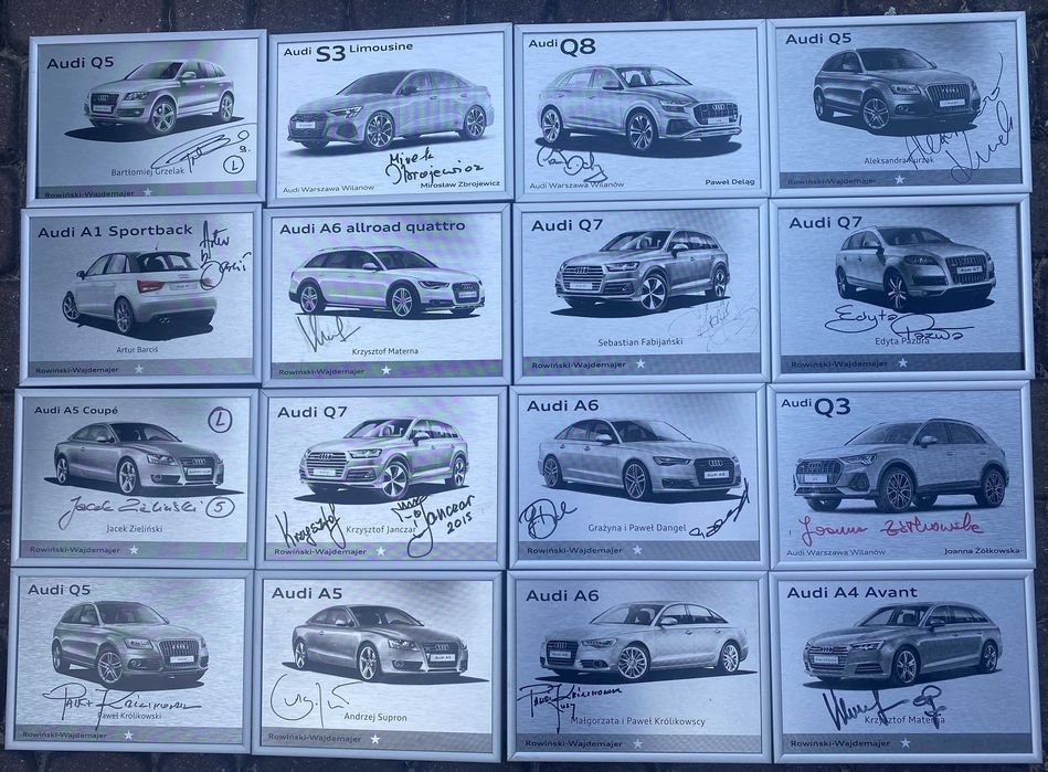 Tabliczki z autografami i modelami Audi