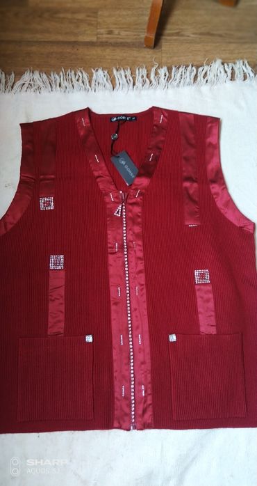 Продам желет новый вязаный