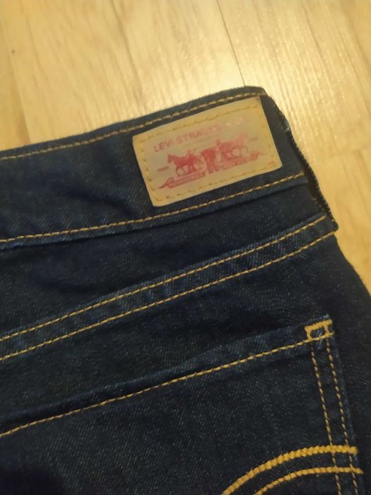 Granatowe damskie jeansy Levi's legging 30/32