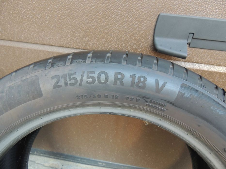 Opony -Premium Continental-  -215/50/18 -