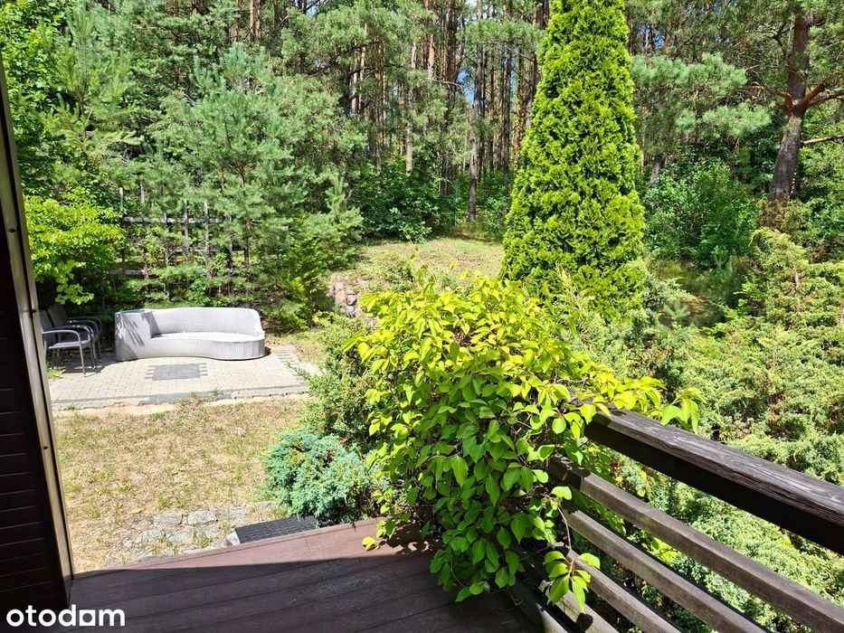 Domek letniskowy z sauną nad jeziorem, 1100m² ogrodzonego terenu.