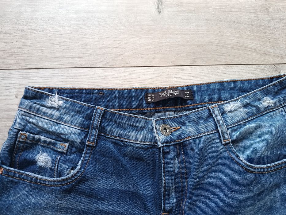 Spodnie jeansy z rozdarciami  Zara TRF r 36