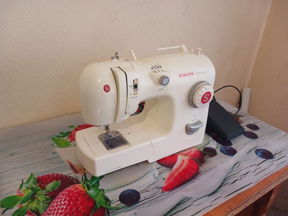 Продам  швейну машинку Singer