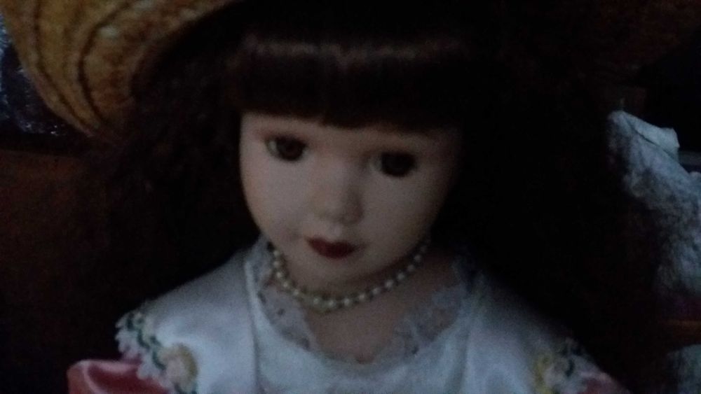 Magnifica boneca porcelana