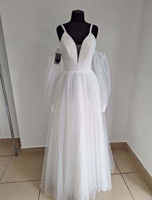 Продам нові весільні плаття