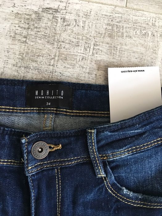 Nowe spodnie jeansowe z naszywkami Mohito xs 34